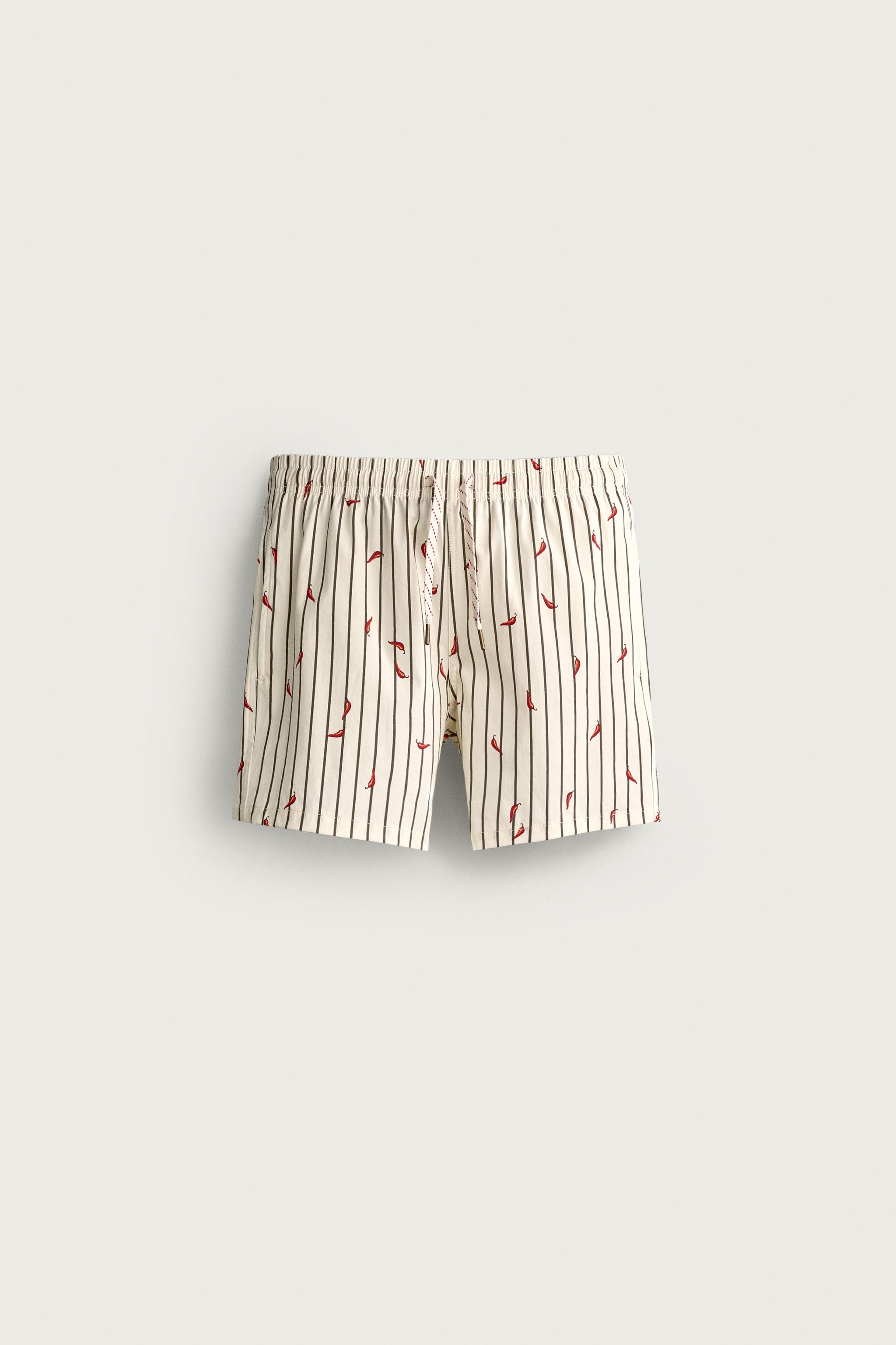MAILLOT DE BAIN MI-LONG À RAYURES ET PIMENTS